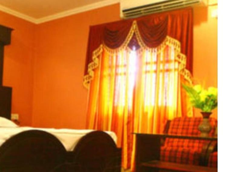 Hotel Priya Chengannur Rum bild